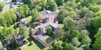 10 Jahre CVJM-Hochschule in Kassel Luftbild vom Campus der CVJM-Hochschule in Kassel