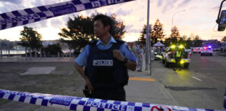 Bestürzung über Terroranschlag auf Juden in Sydney Abgesperrter Strand in Sydney nach dem Anschlag