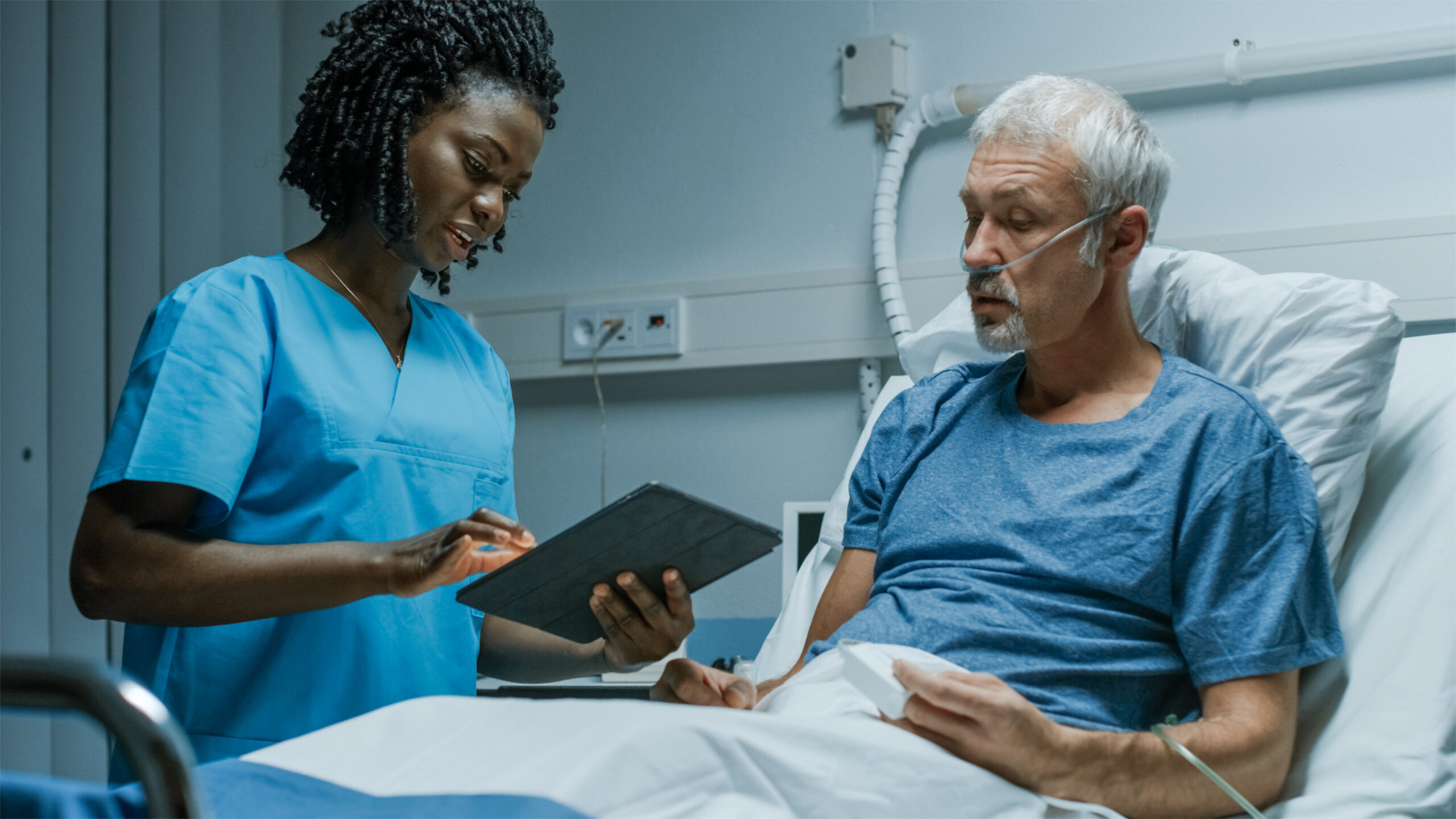 Krankenschwester mit Patient